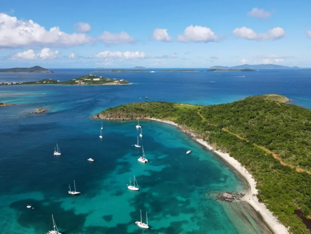 Aerial view of yachts anchored off Fish Cay near Great Saint James, a scenic stop on USVI yacht charter itineraries.