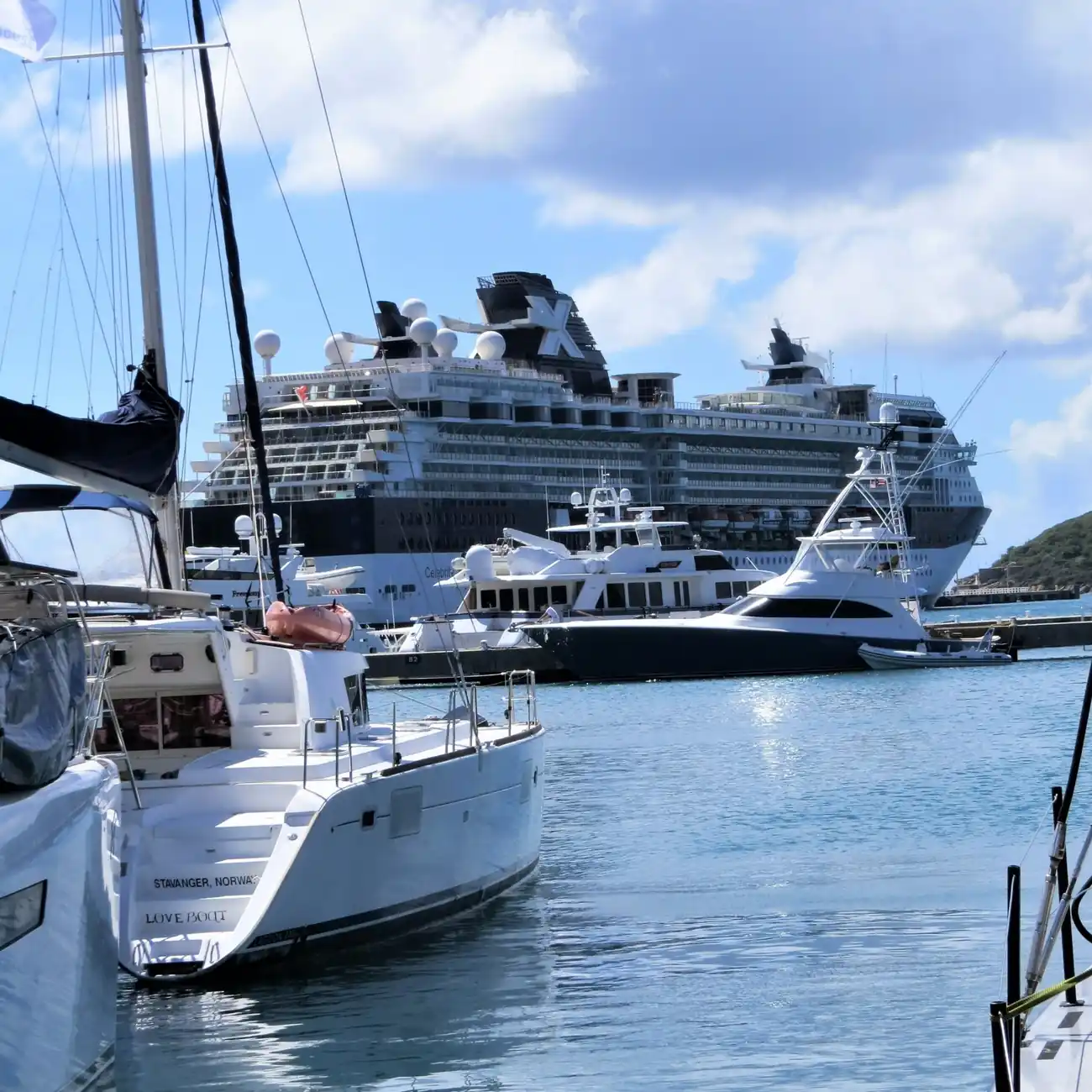 Yachts in St. Thomas marina with a cruise ship during a St. Thomas and St. John yacht charter itinerary